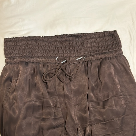 Chocolate brown satin cargo pants from Anthropologie with elastic ankles - Picture 2 of 6